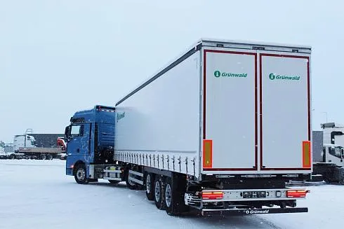Тягач Sitrak C7H MAX 4x2 с шторным полуприцепом Grunwald