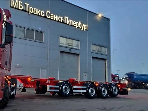 Контейнеровозная сцепка: тягач SITRAK C7H MAX 4х2 с полуприцепом-контейнеровозом Grunwald