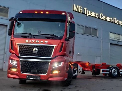 Контейнеровозная сцепка: тягач SITRAK C7H MAX 4х2 с полуприцепом-контейнеровозом Grunwald