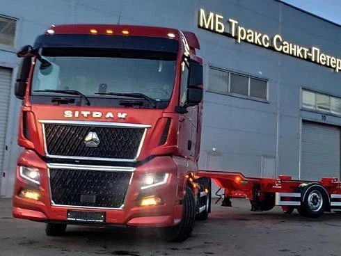 Контейнеровозная сцепка: тягач SITRAK C7H MAX 4х2 с полуприцепом-контейнеровозом Grunwald