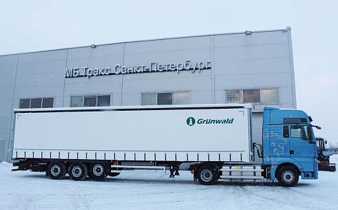 Тягач Sitrak C7H MAX 4x2 с шторным полуприцепом Grunwald