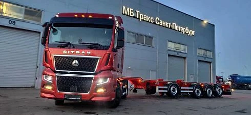 Контейнеровозная сцепка: тягач SITRAK C7H MAX 4х2 с полуприцепом-контейнеровозом Grunwald